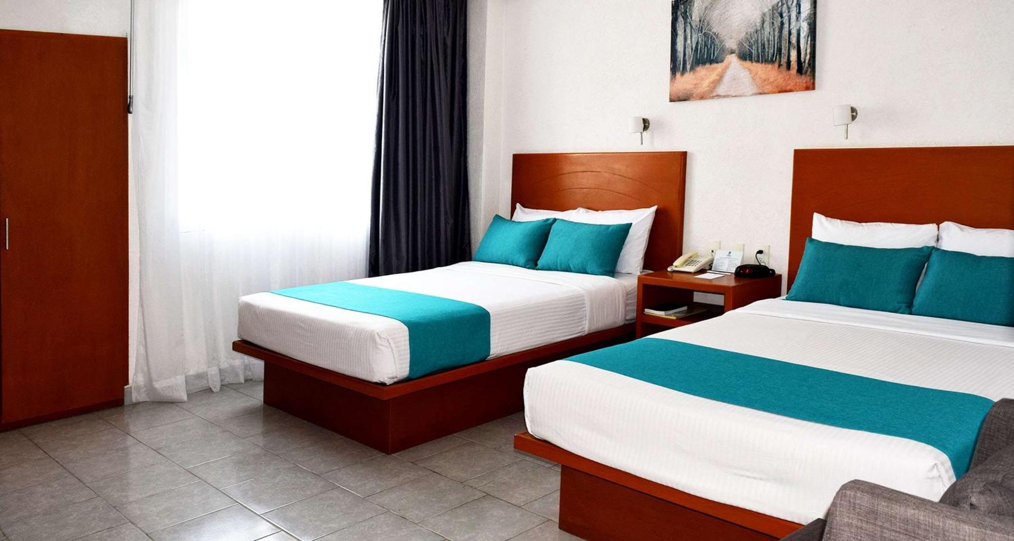 Habitación Doble con 2 camas dobles - No fumadores